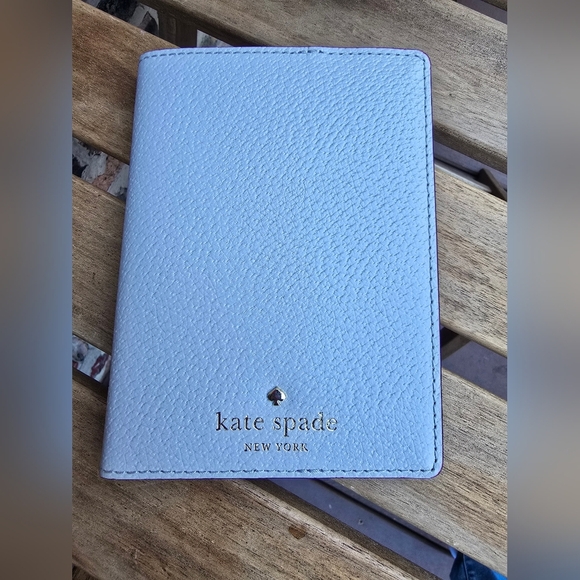 kate spade Handbags - Kate Spade Sky Blue Leather Travel Wallet